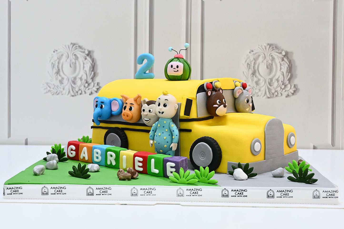 Cocomelon bus cake